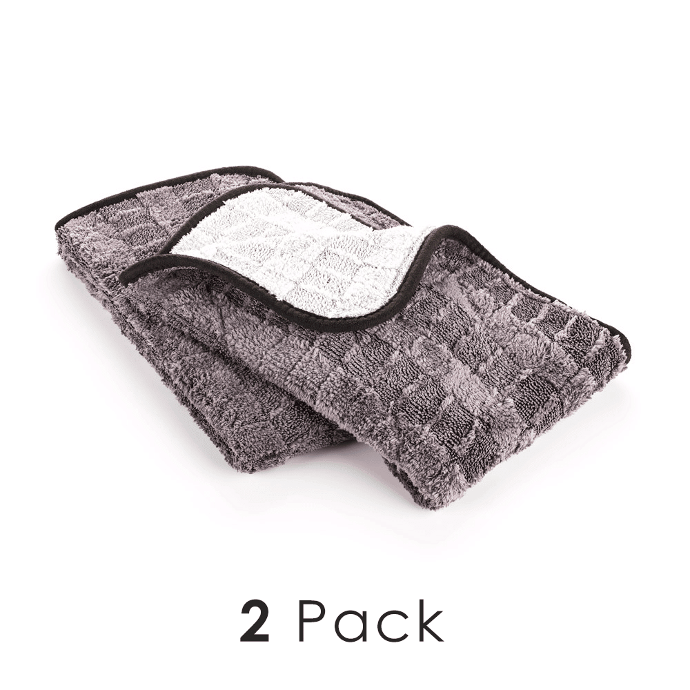 Two gray Gauntlet drying towels